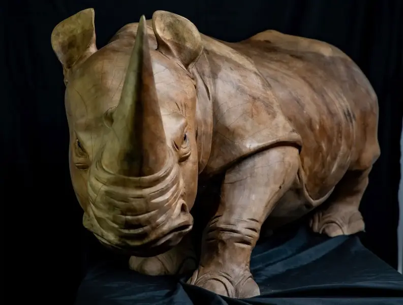 Product image 1 of the product “Rhinocerus, carved from Suar wood. In the sizes from 120 to 150cm. ”